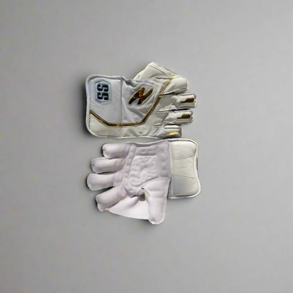 SS Wicket Keeping Gloves designed for professionals, featuring premium quality leather for top performance. The gloves have breathable perforated leather sheepskin on the back for comfort. Fully leather-lined for durability, with a high-density foam cuff for wrist protection. Additional finger protection for safety and available in a stylish white/gold color combination.